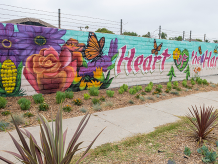 mural on a wall "Heart Harbor" with flowers, produce