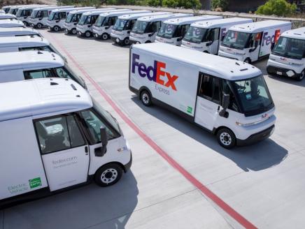 FedEx electric vehicles in parking lot
