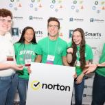 5 students holding a Norton sign