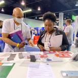 Rockwell’s Derek Gallon chats with a NSBE attendee.