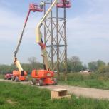 The 65-foot tower is intended as a new perch for Harold and Ludwig, a pair of peregrine falcons that typically nest on the Whiting plant.