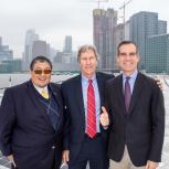 Doane Liu, Executive Director of the City of Los Angeles Department of Convention and Tourism Development; Brad Gessner, Senior Vice President of AEG Facilities and General Manager of the LACC and Mayor Eric Garcetti celebrate Los Angeles’ No. 1 status as most solar powered city in the United States at the solar array installation on the roof of the Los Angeles Convention Center on April 4, 2018.