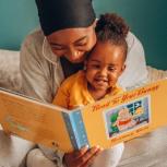 mother reading to daughter 