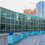 Planters with various vegetables and citrus trees line the rooftop of the Los Angeles Convention Center above the South Hall lobby to make up the convention center’s first rooftop garden in downtown Los Angeles.