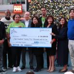The AEG Community Foundation awards one of its first macro grants to Wellnest in Los Angeles during AEG's annual Community Holiday Party at L.A. LIVE on December 17, 2019.