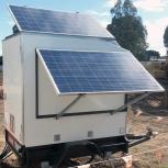A large white box fitted with two solar panels
