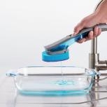 washing a dish with a sponge 