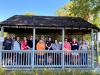 Rockwell’s Jason Sprunk (far left) and Rachel Schickowski (far right, front row) with several fellow members of the company’s ROKability employee resource group.