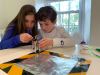 kids working on science experiment 