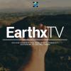 Photo of hand with EarthX TV label. 
