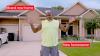 Man standing in front of house