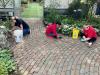 KeyBank volunteers working on a garden path.