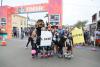 LA Kings mascot Bailey and Daryl Evans cheer on participants with members of the LA Lions, the club’s youth girls club at the annual LA Kings 5K benefitting the LA Kings Care Foundation and Hydrocephalus Association on September 18, 2021 in Redondo Beach, Calif.