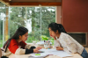 two girls studying