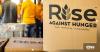 "Rise Against Hunger" written on boxes
