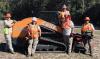 CNH employees with equipment