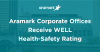 banner image of building with these words, "Aramark Corporate Offices Receive WELL Health-Safety Rating"